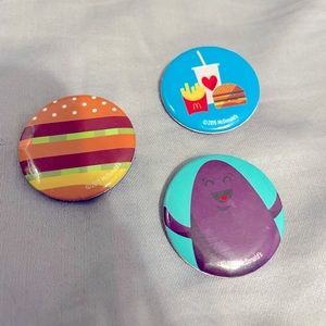Lot of 3 collectible McDonald’s pins.